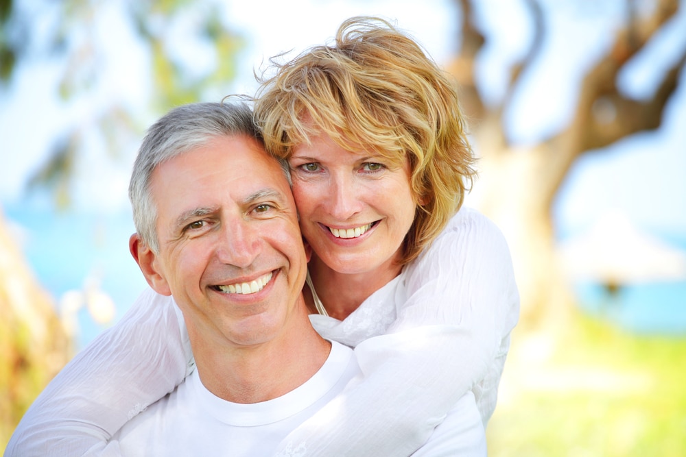 Close-up,Portrait,Of,A,Mature,Couple,Smiling,And,Embracing.,Focus